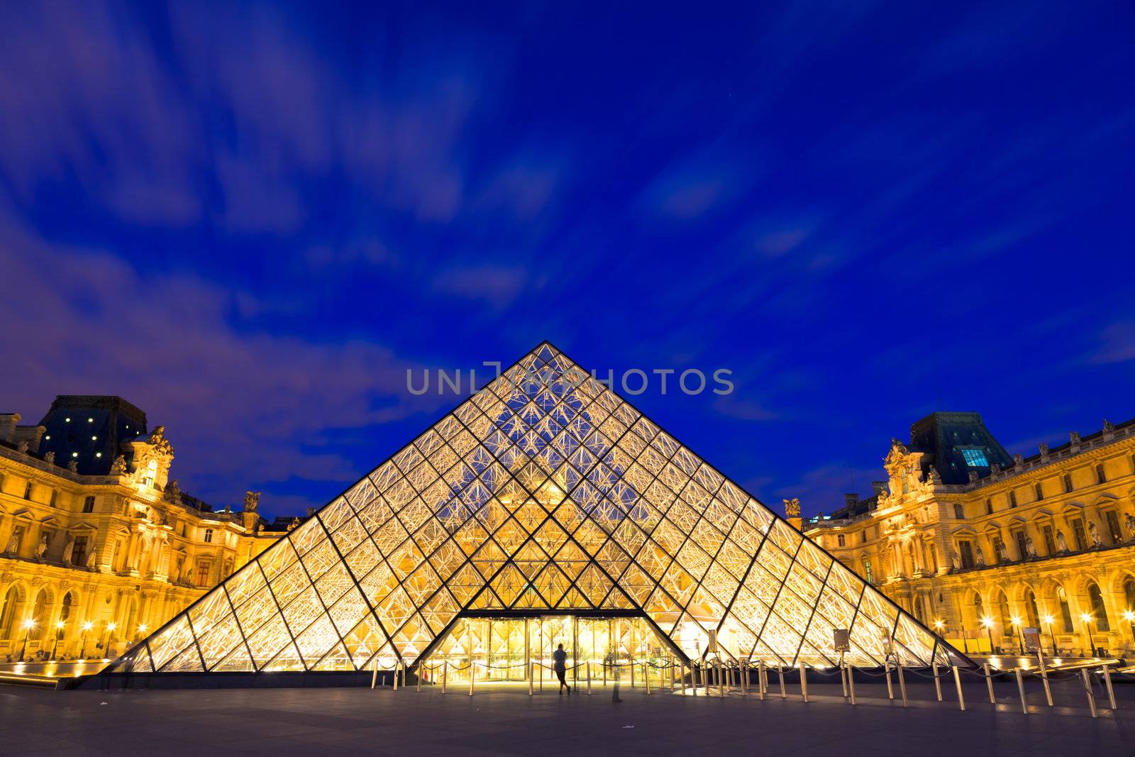 PARIS - AUGUST 05, 2010: 
The Louvre at night on August 05, 2010 in Paris, France. EDITORIAL USE ONLY.