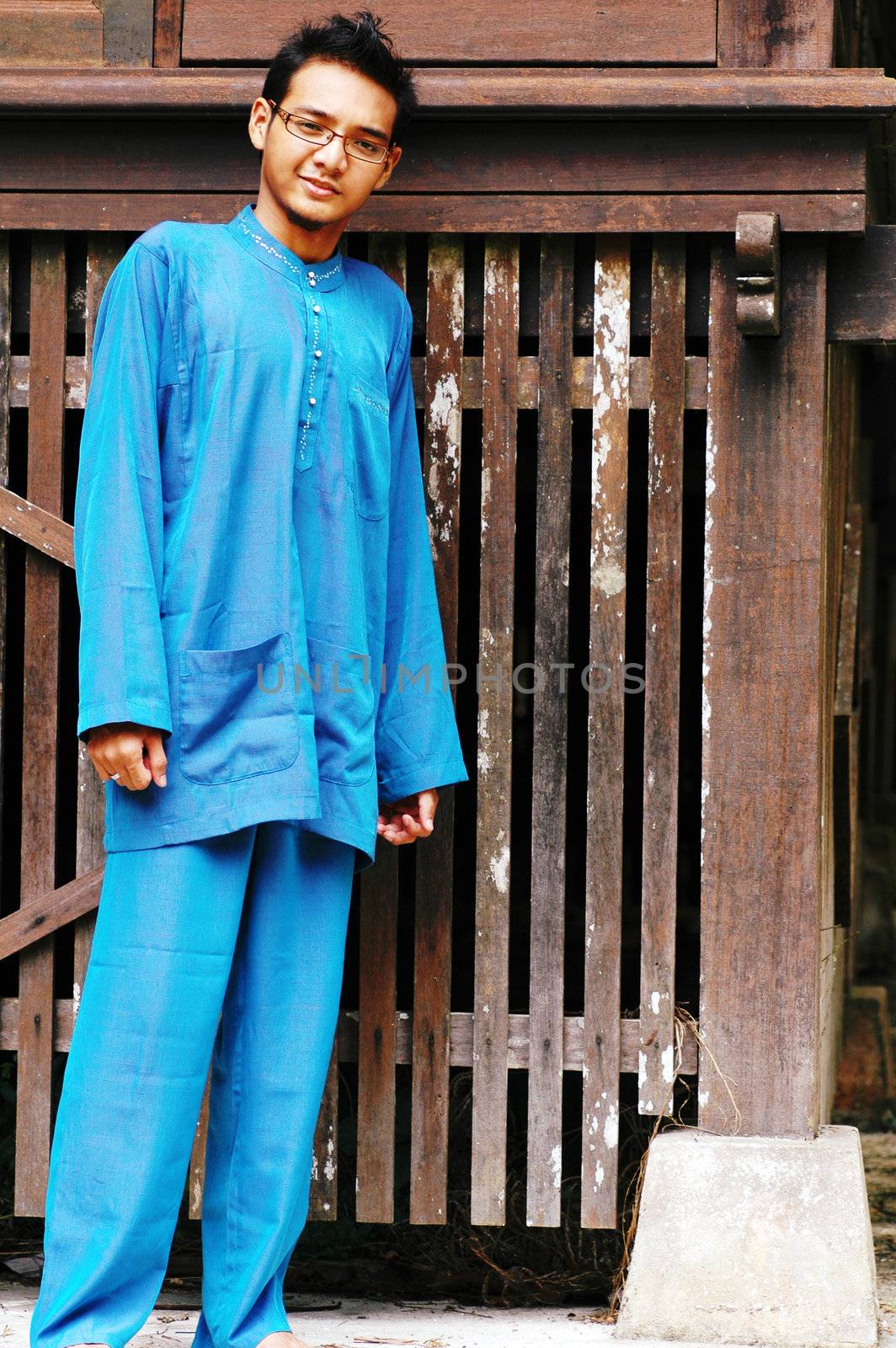 Asian male in traditional Malay costume, Baju Melayu