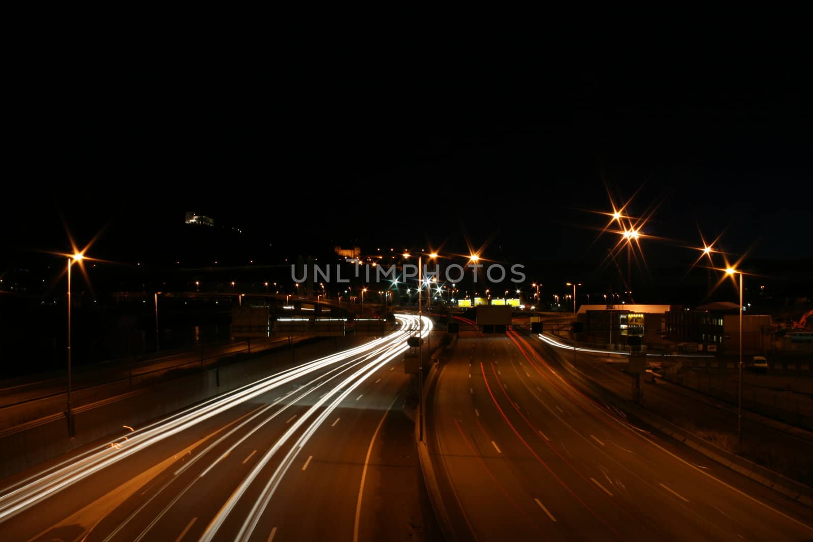 Cars driving in Oslo at Night.