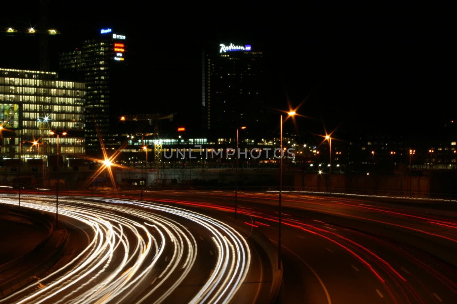 Cars driving in Oslo at Night.