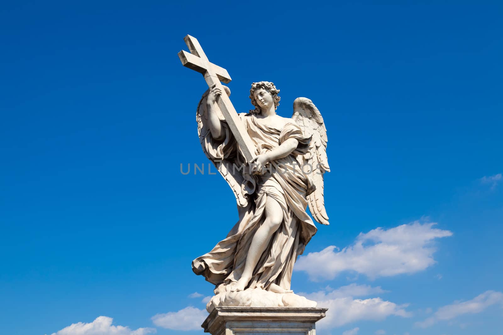 Angel statue with a cross (Sant'Angelo Bridge, Rome, Italy)