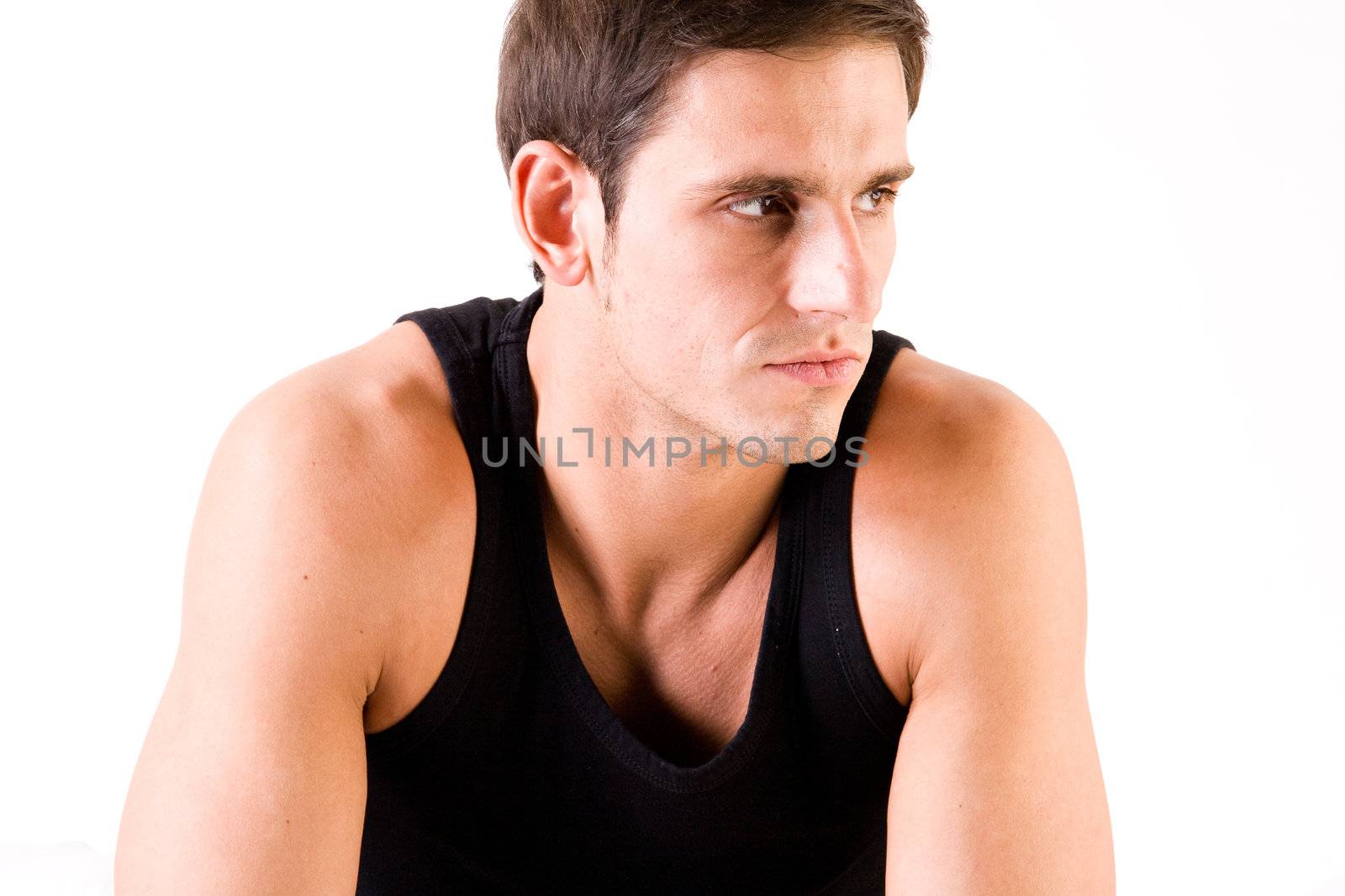 Young man portrait in the studio on a white background