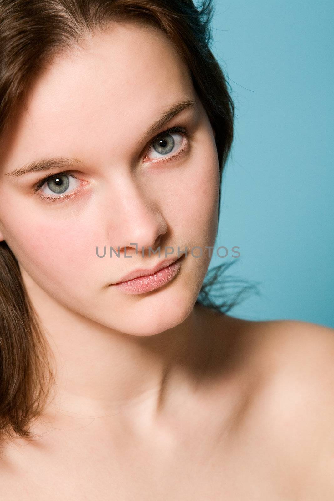 Natural portrait of a girl with short brown hair