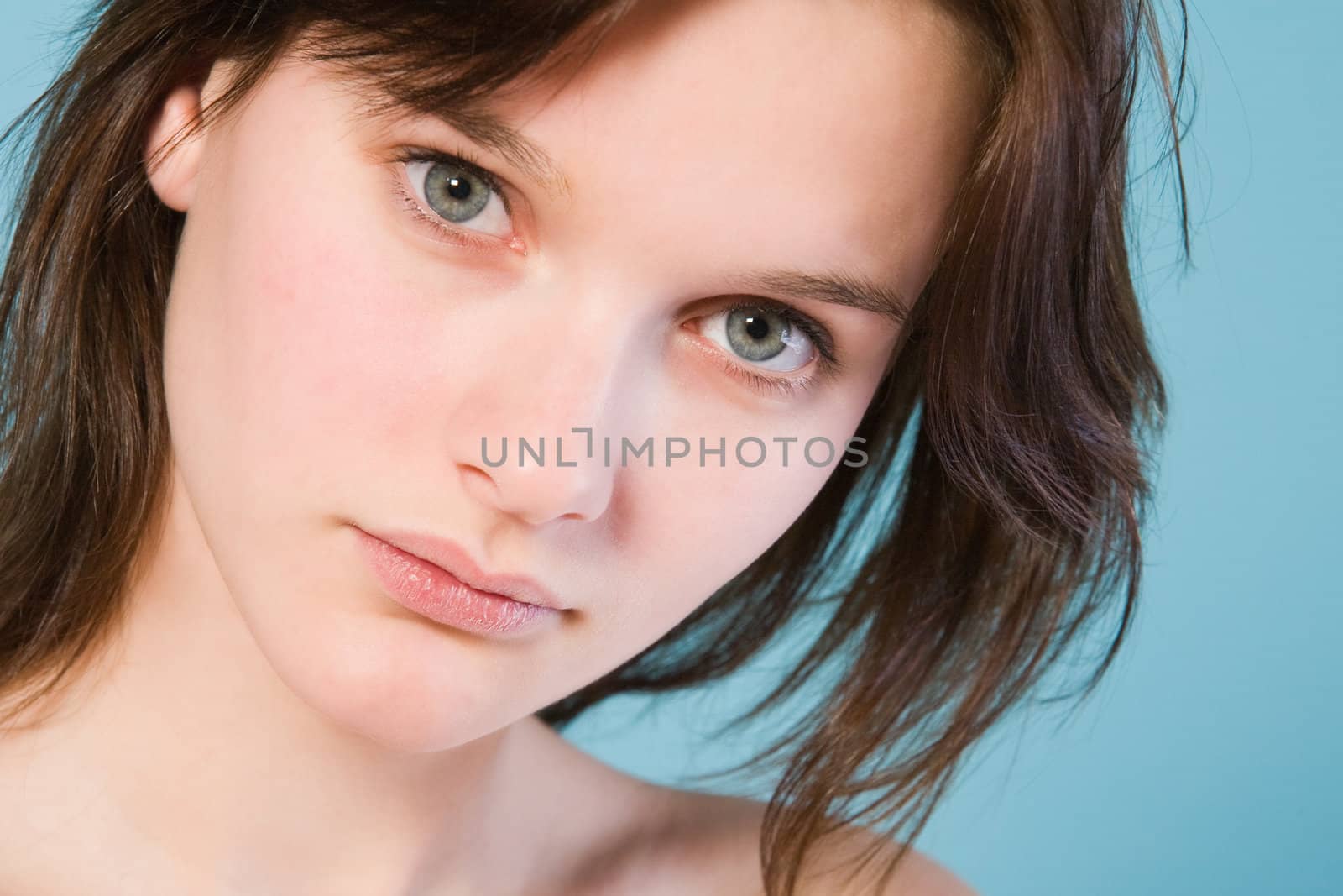 Natural portrait of a girl with short brown hair