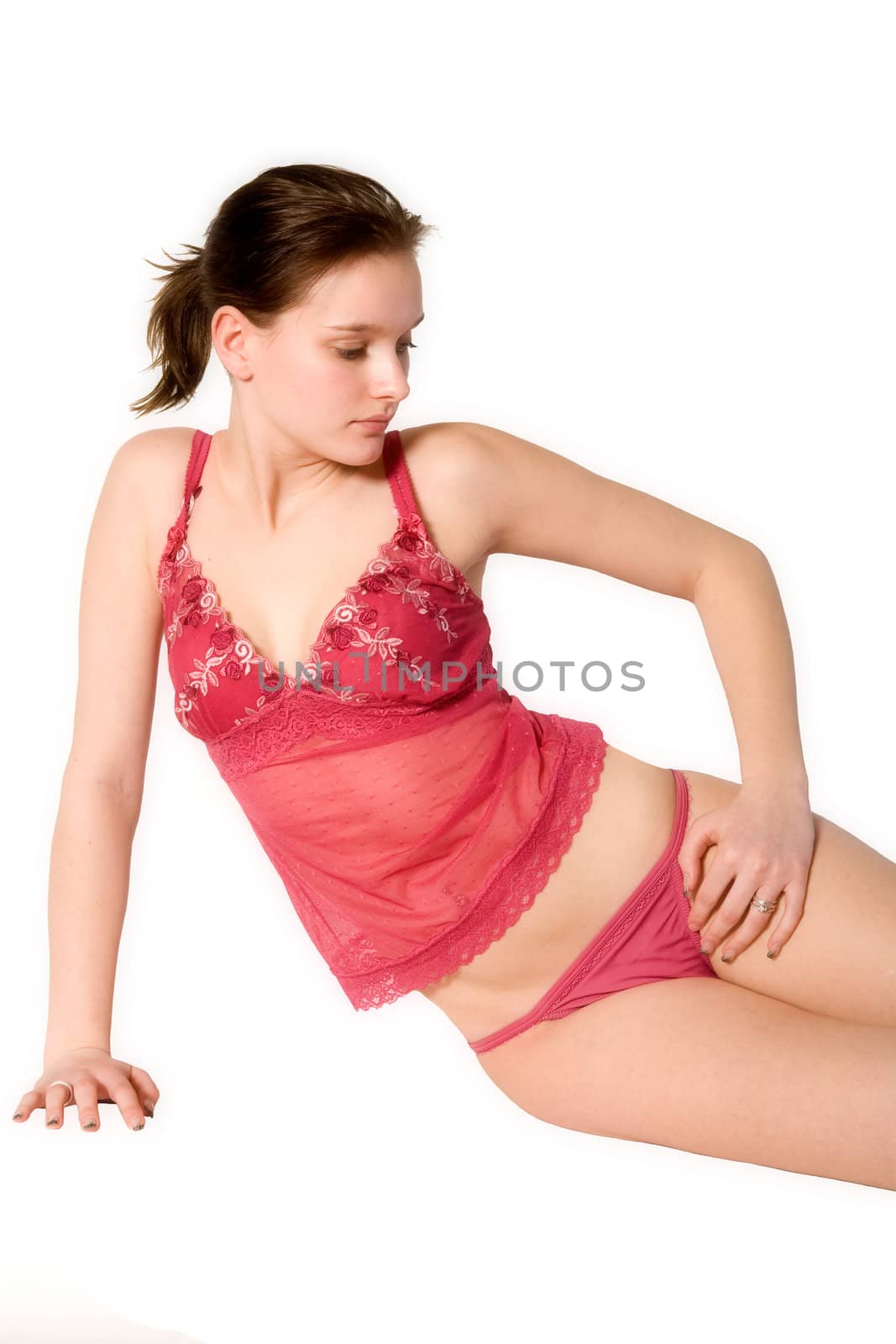 Studio portrait of a young woman in red lingerie