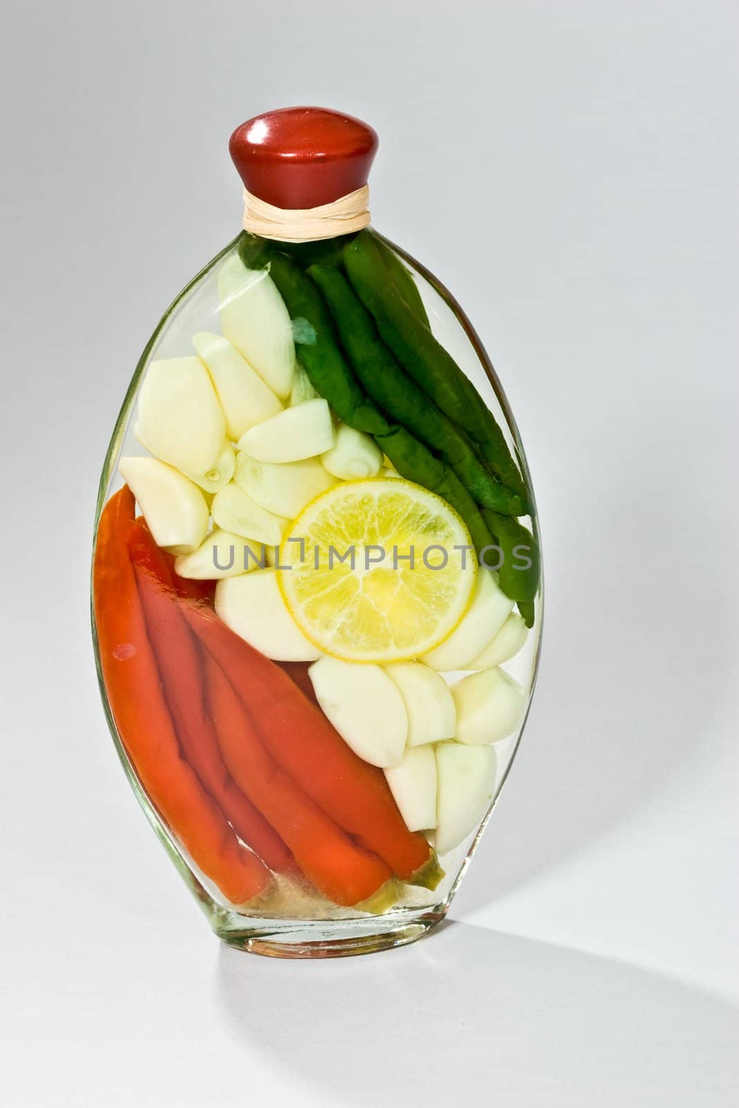 food series: pepper, lemon, garlic in a special oil