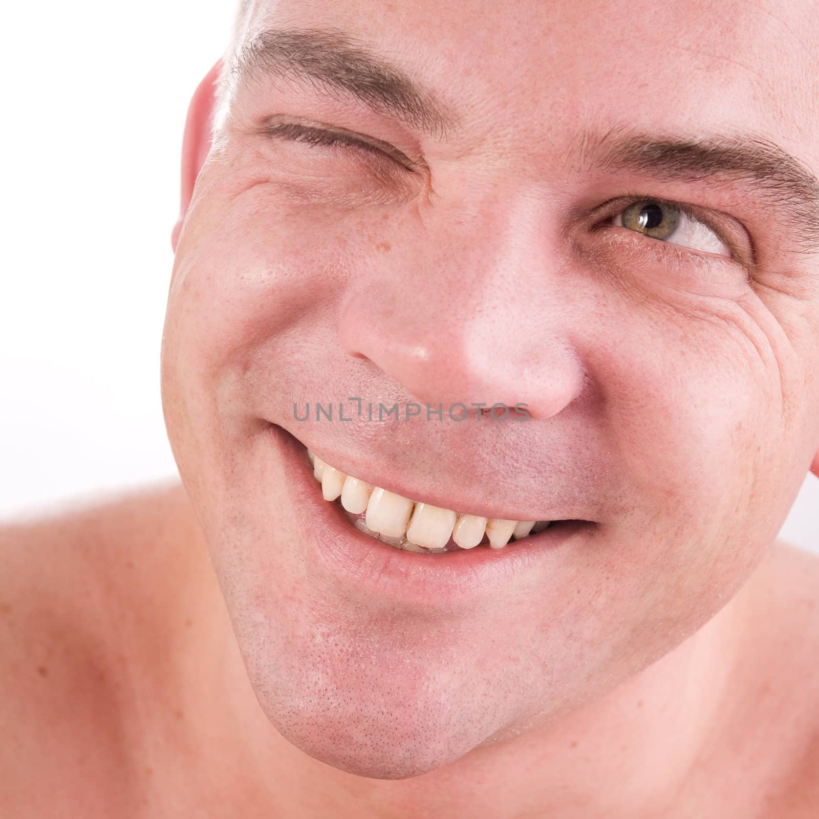 Young man portrait in the studio on a white background