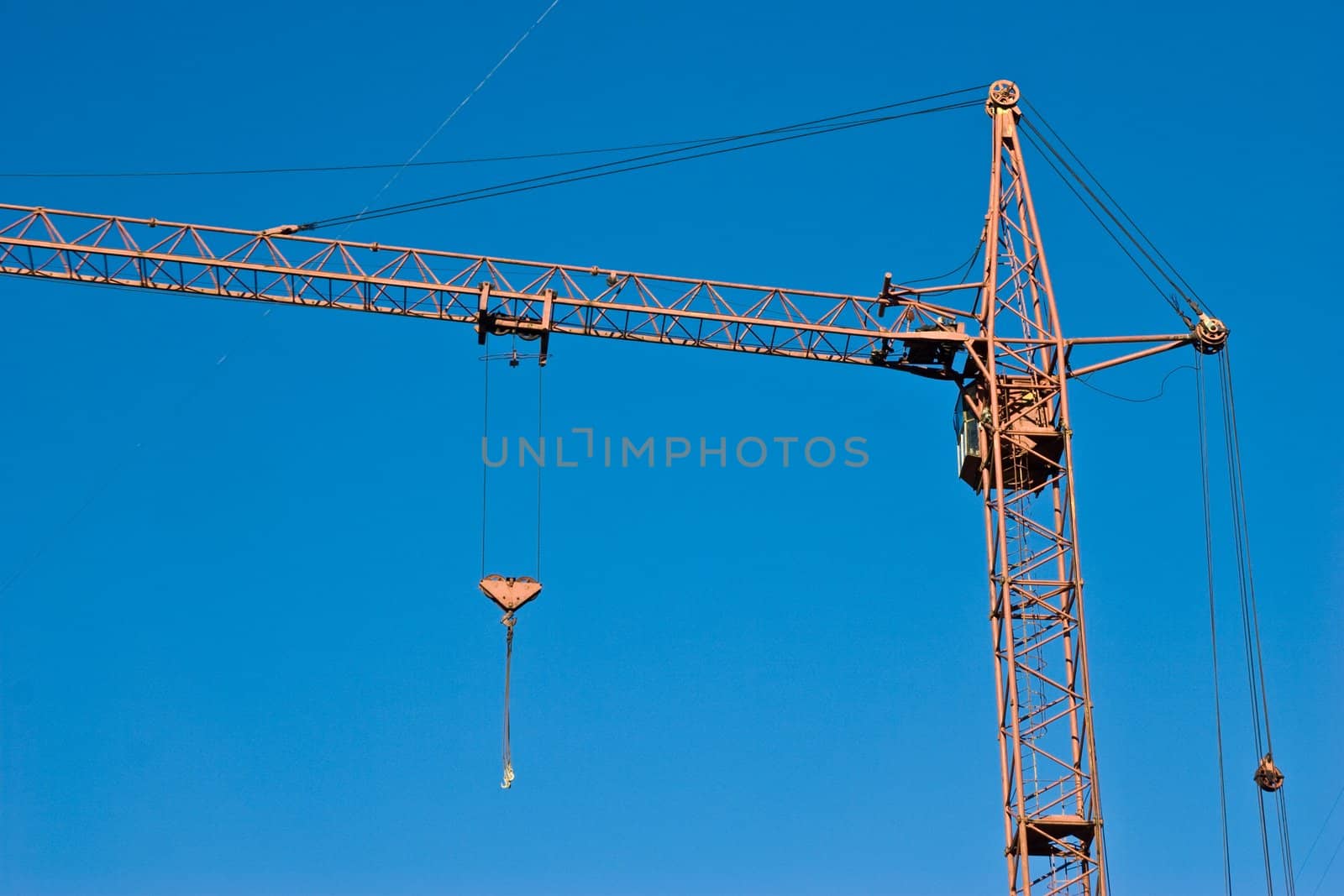 construction series: crane with gibbet on the blue sky