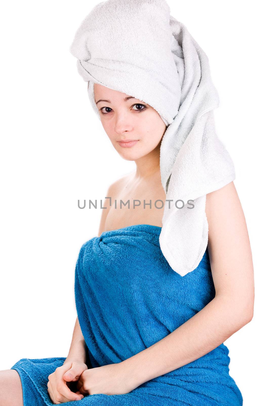 Young woman looking with a towel on her head