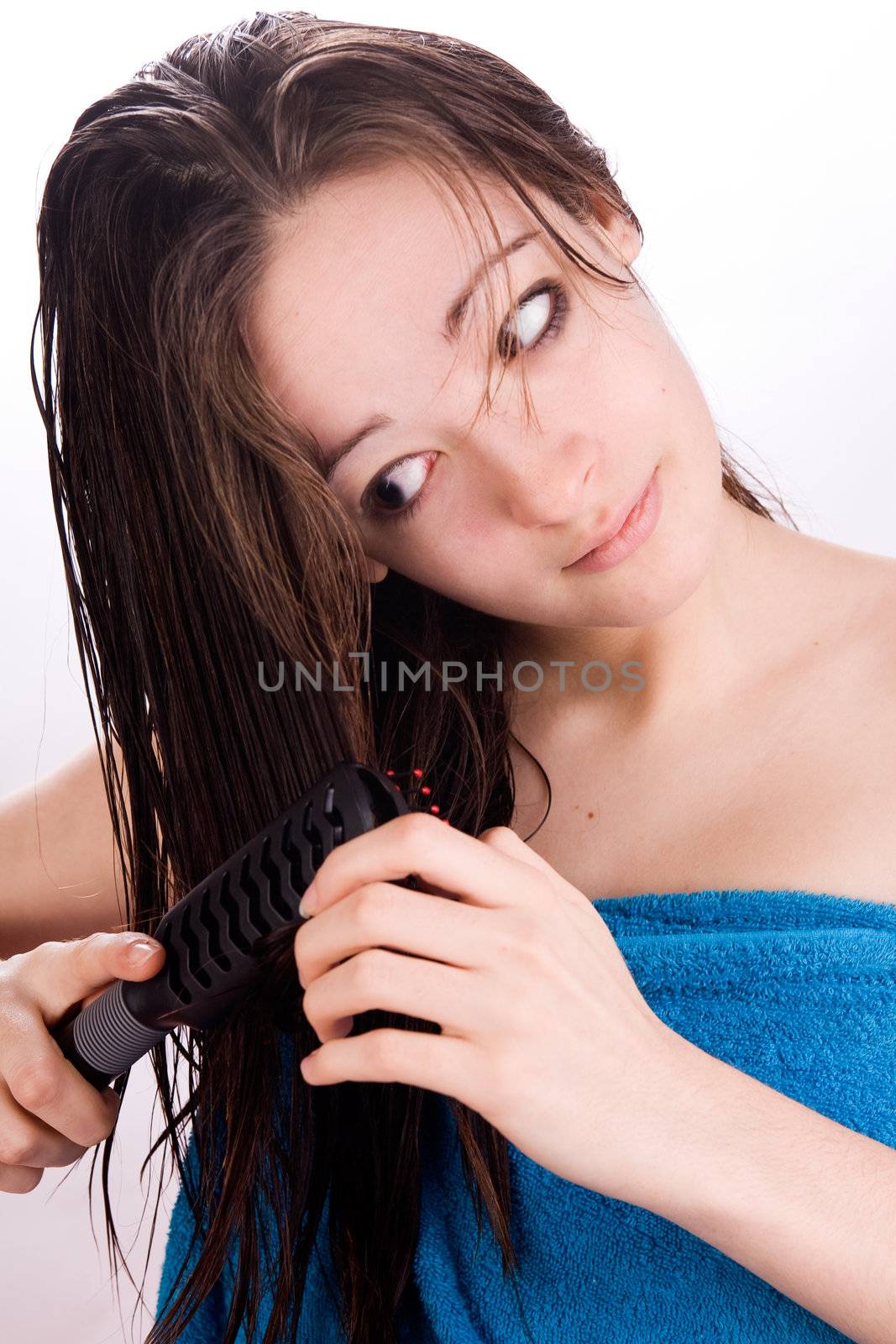 Woman is looking at her hair by DNFStyle