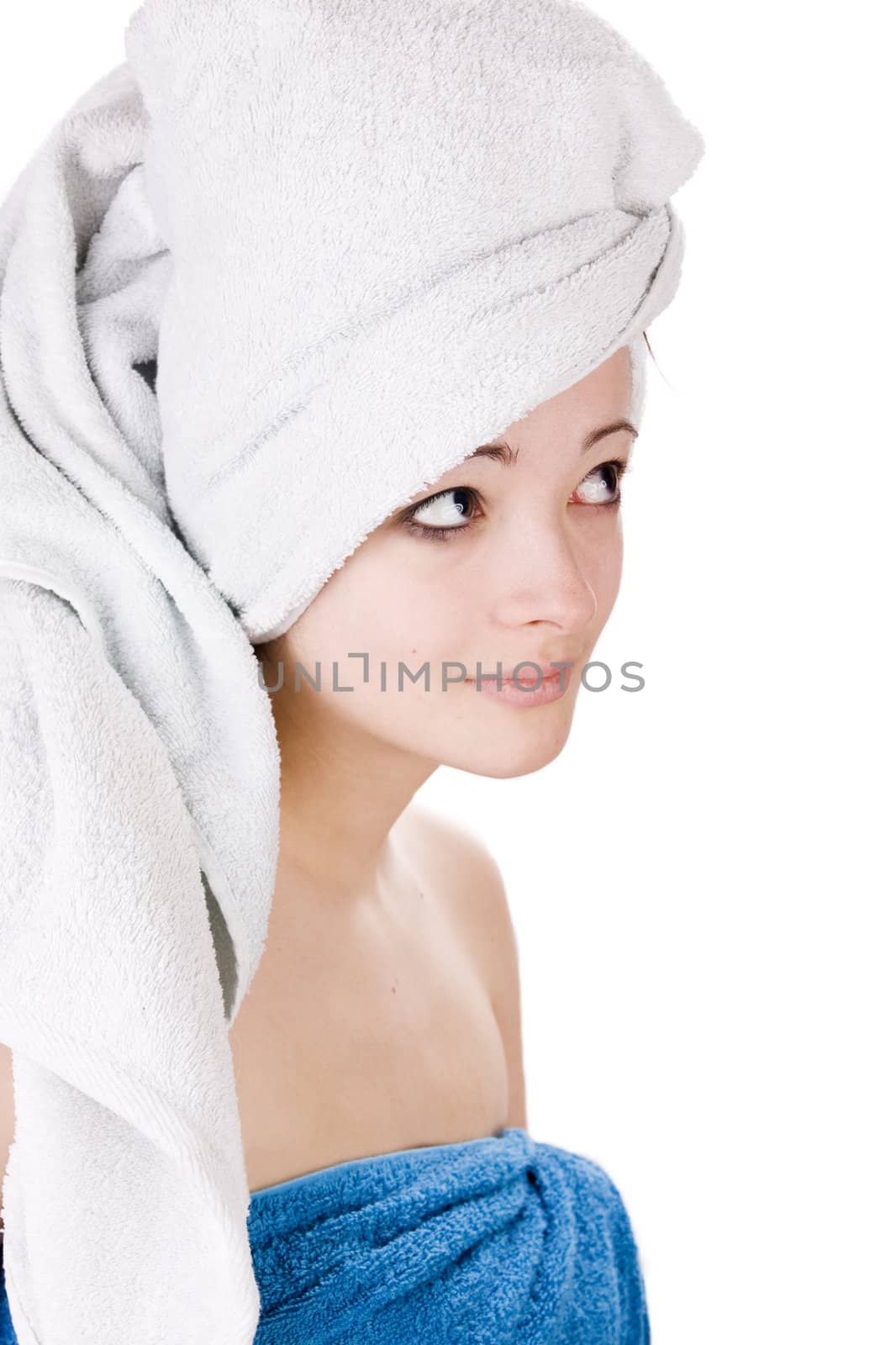Young woman looking with a towel on her head