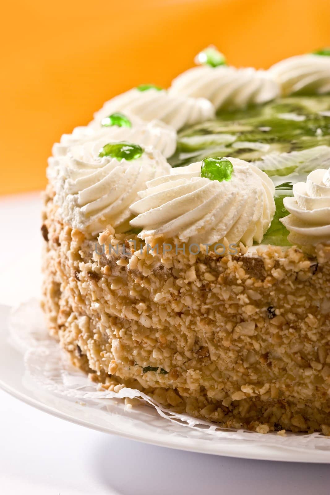 Bisquit cake with  kiwi fruit on the plate