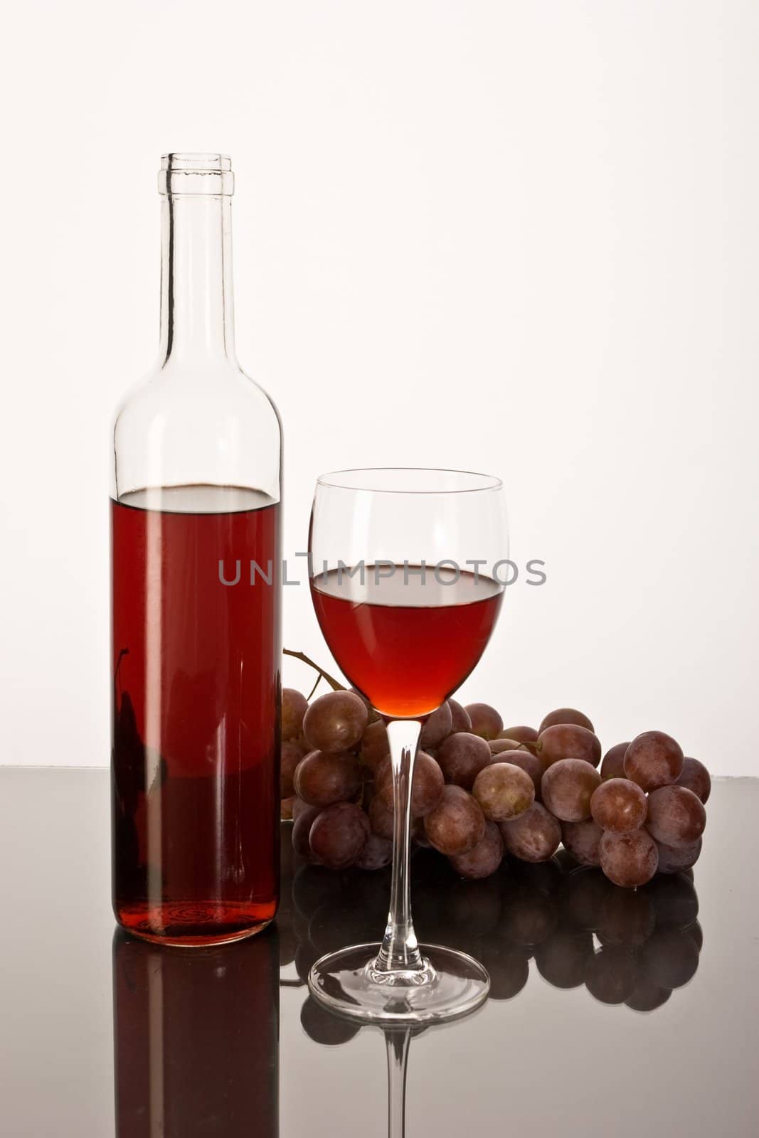 drink series: red wine glass and bottle with grapes