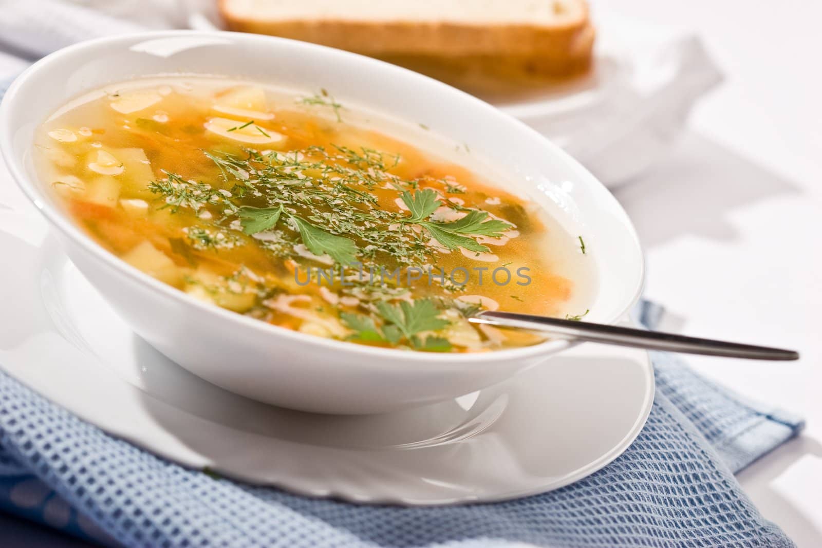 food: macro picture of soup with parsley