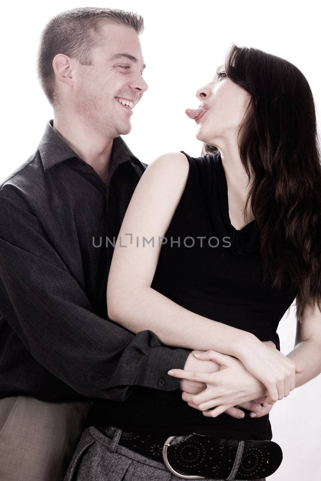 Young couple is making fun in the studio