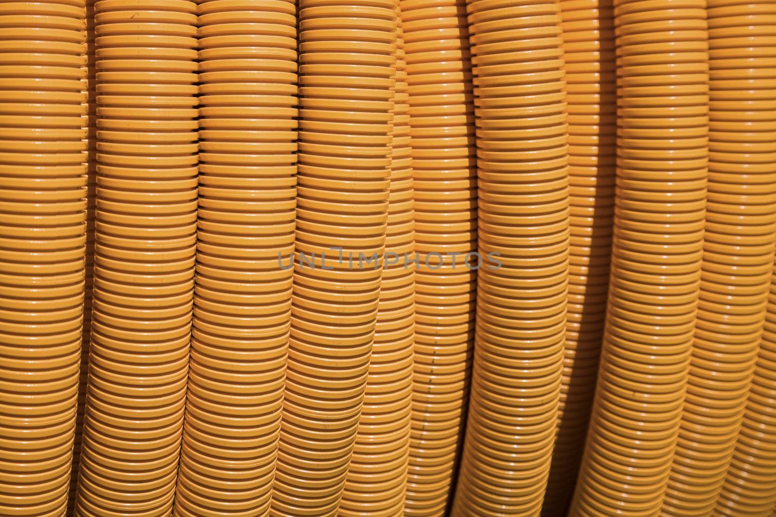 Orange inner duct - enclosure for fiber optic cable.