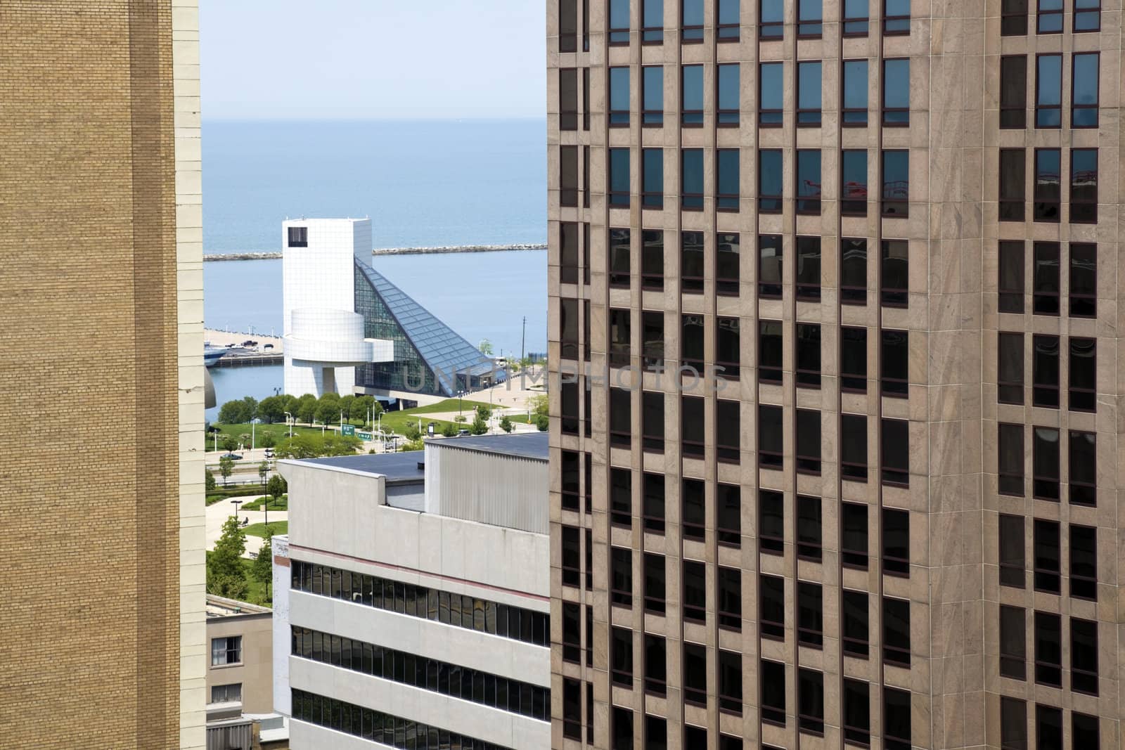 Late Erie shore seen between skyscrapers from downtown Cleveland, Ohio.