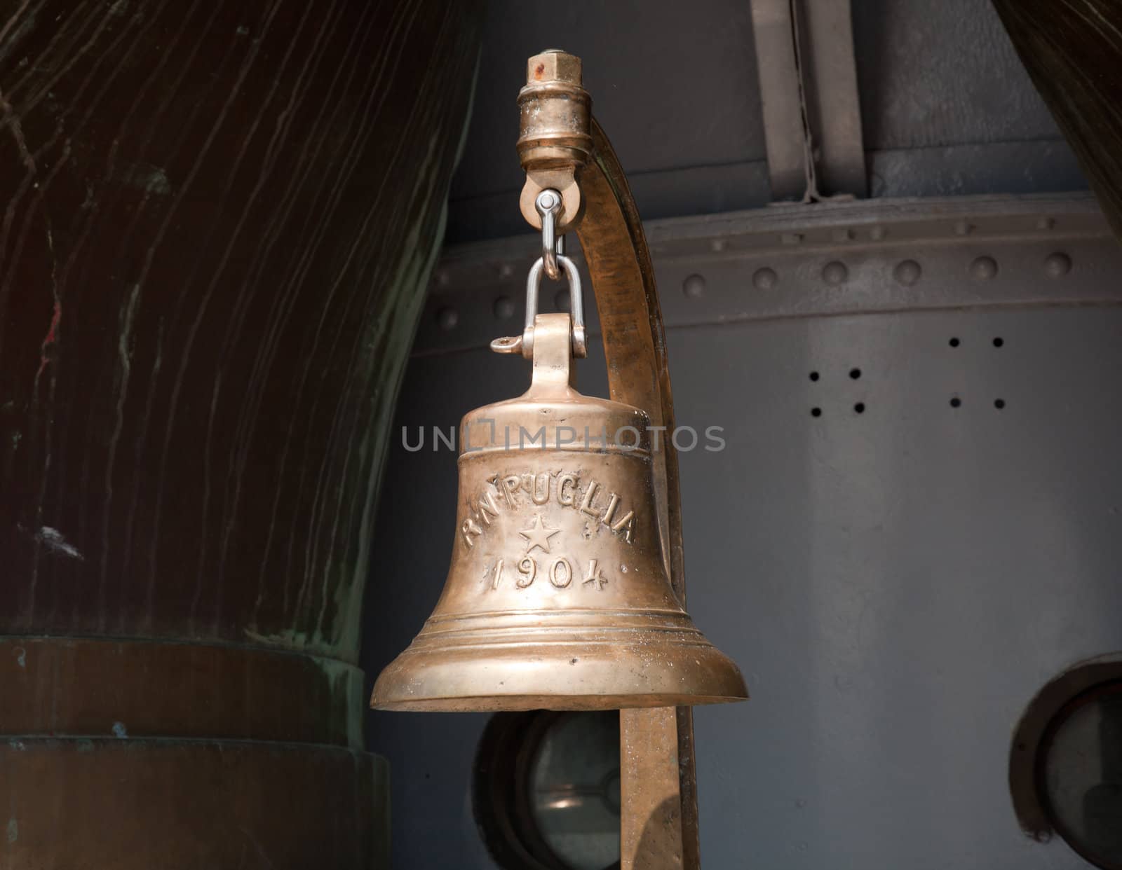 Ships bell on the Puglia warship that is installed in the mountainside on Lake Garda