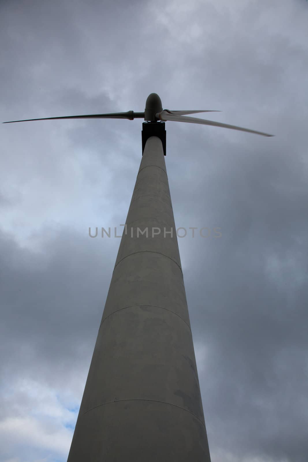 Wind turbine in wind farm on cloudy day in North Wales