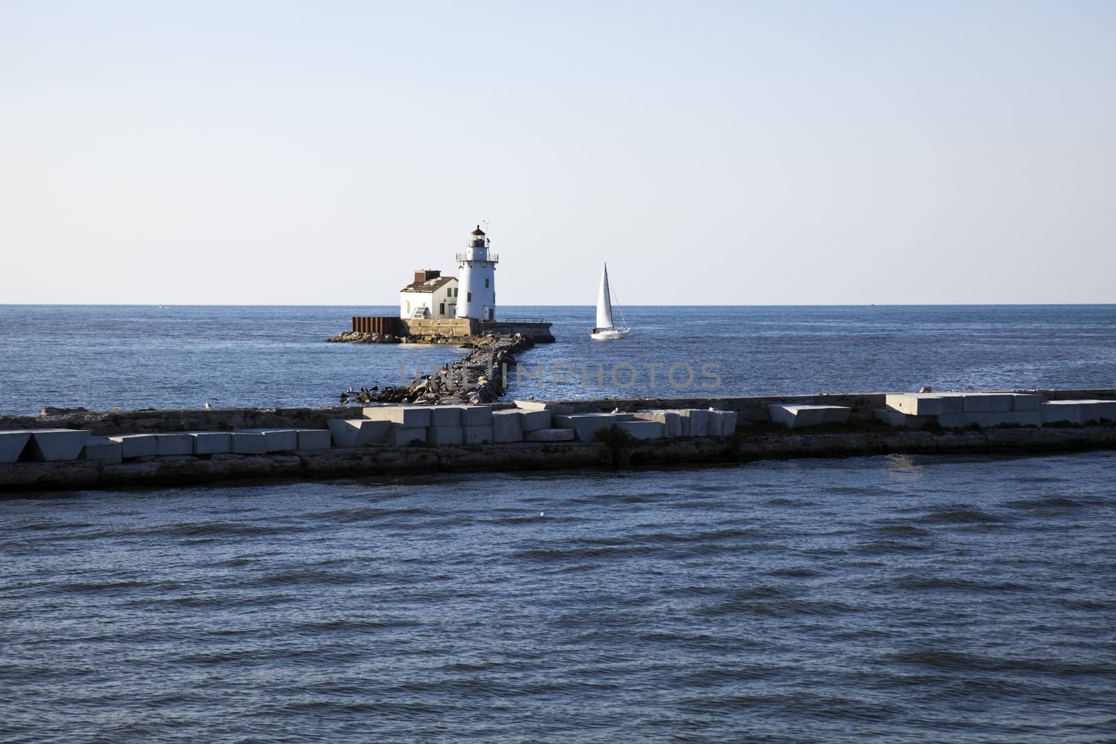 Yacht by Cleveland Harbor West Pierhead - seen from Lake Erie.