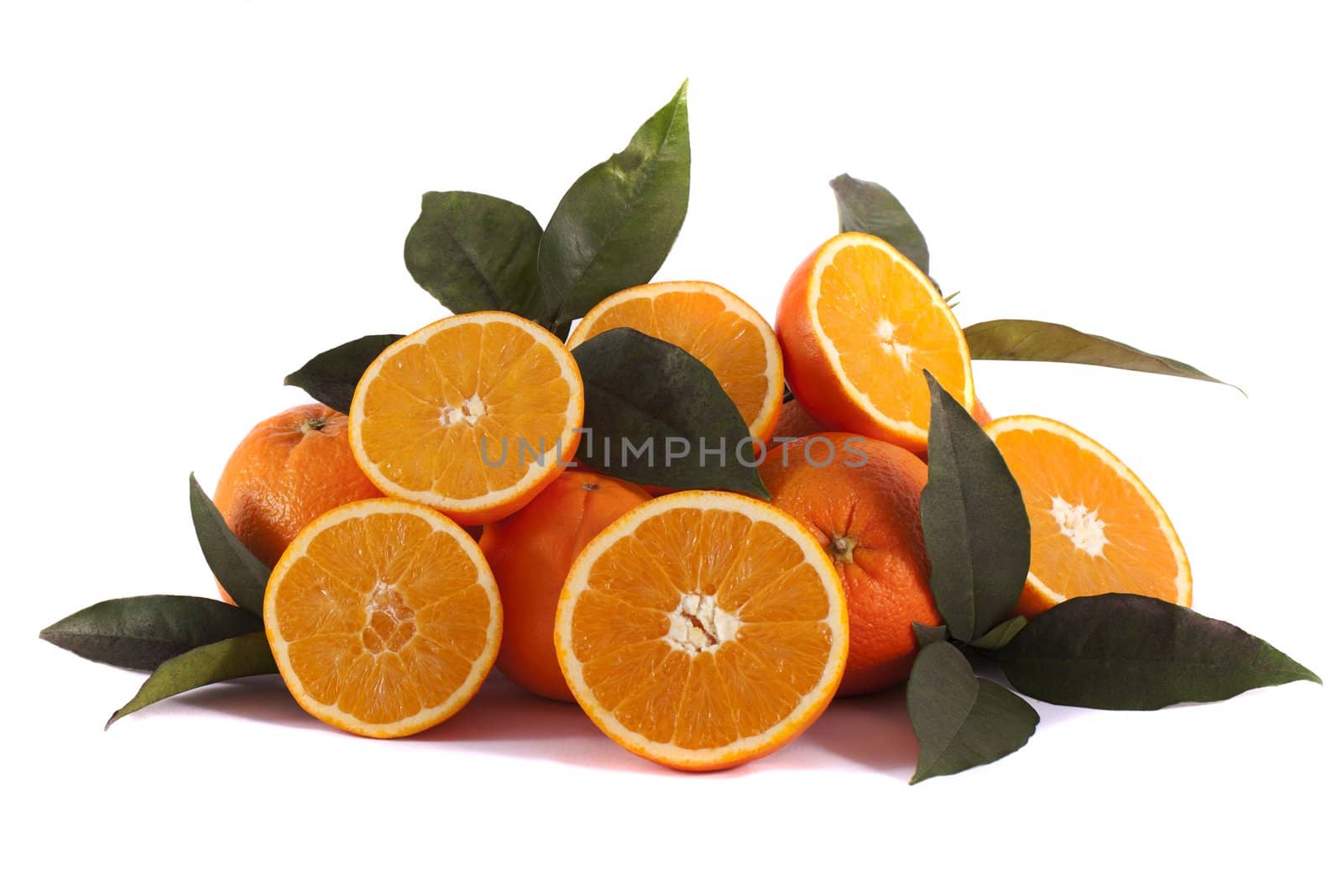 Detail view of a bunch of oranges isolated on a white background.
