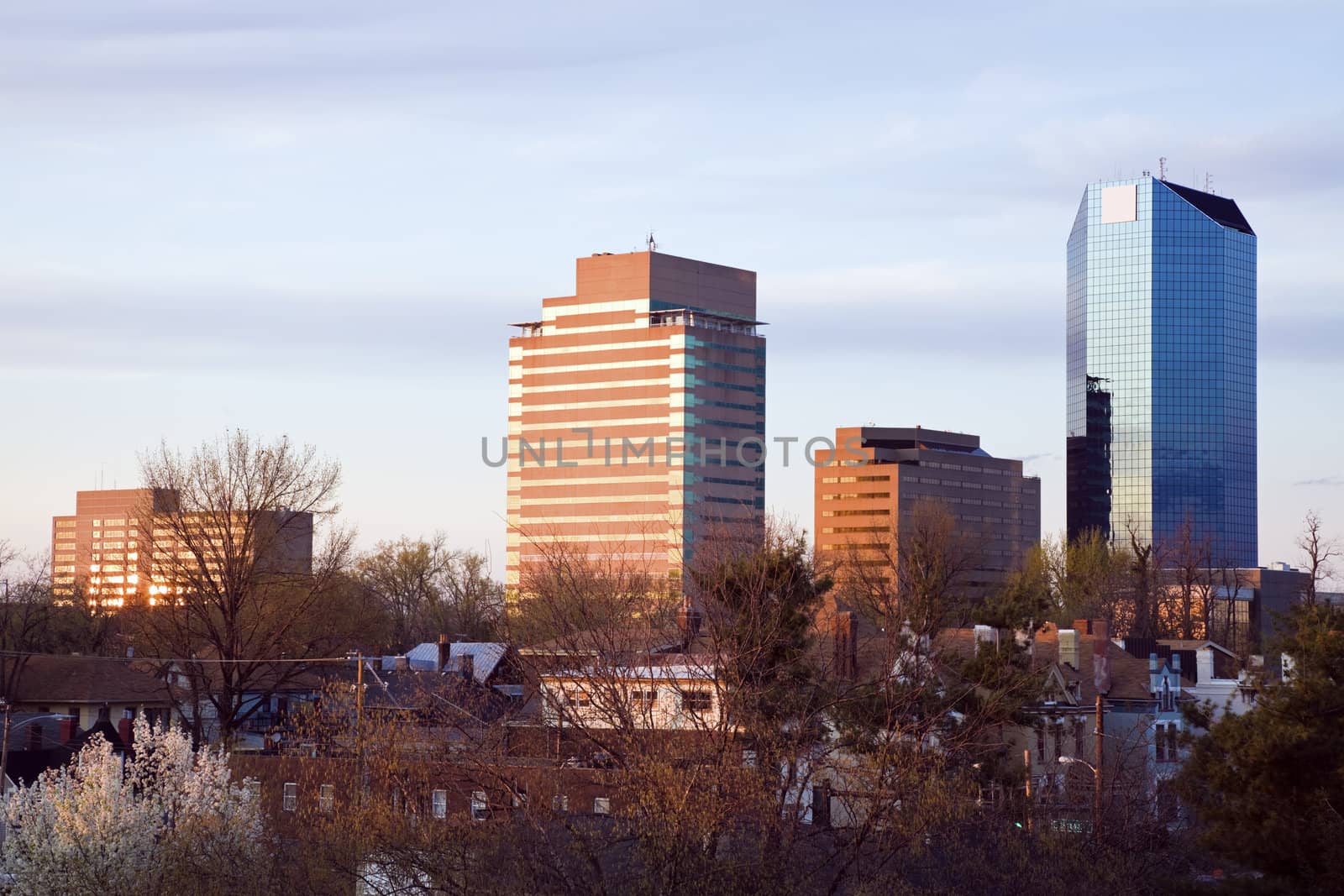 Afternoon light on Lexington buildings. Name of the city on the roof - bottom part of photo.