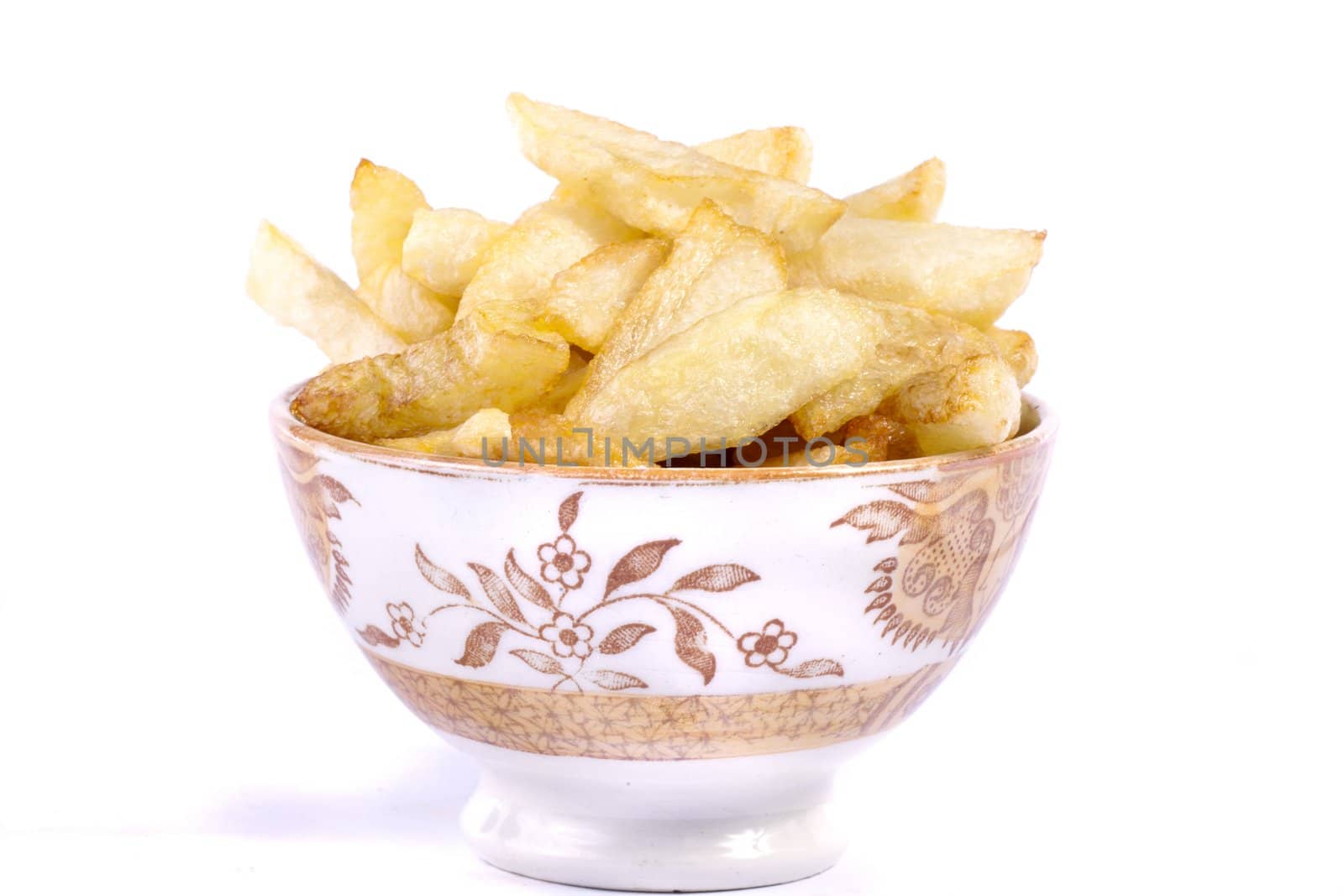 Close up view of a bunch of fried potatoes in slices. 