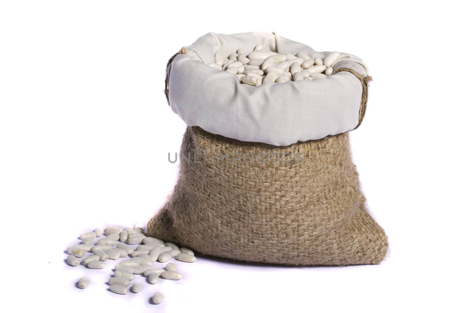View of a sack of long white beans isolated on a white background.