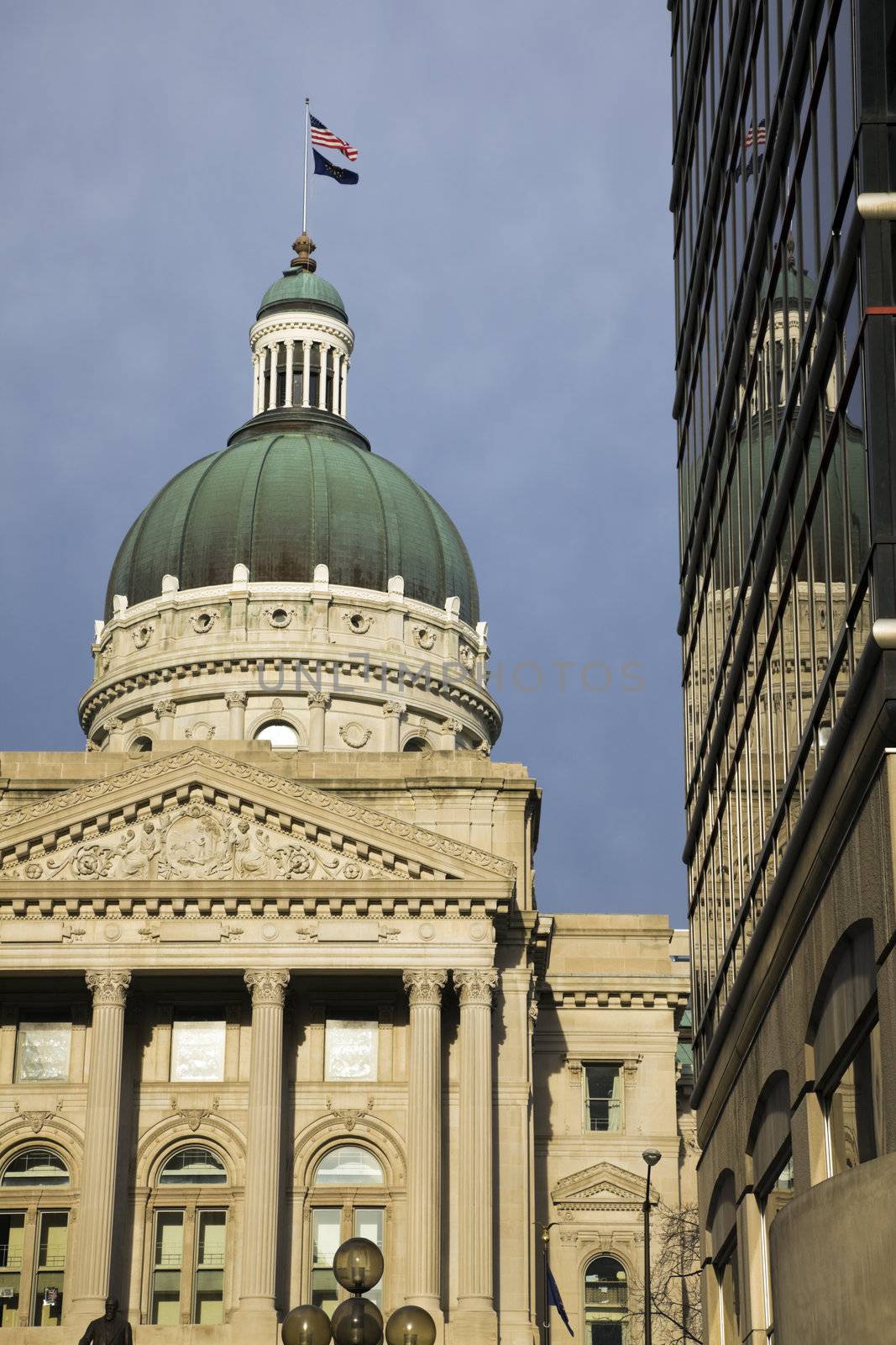 State Capitol of Indiana in Indianapolis reflected in the windows.