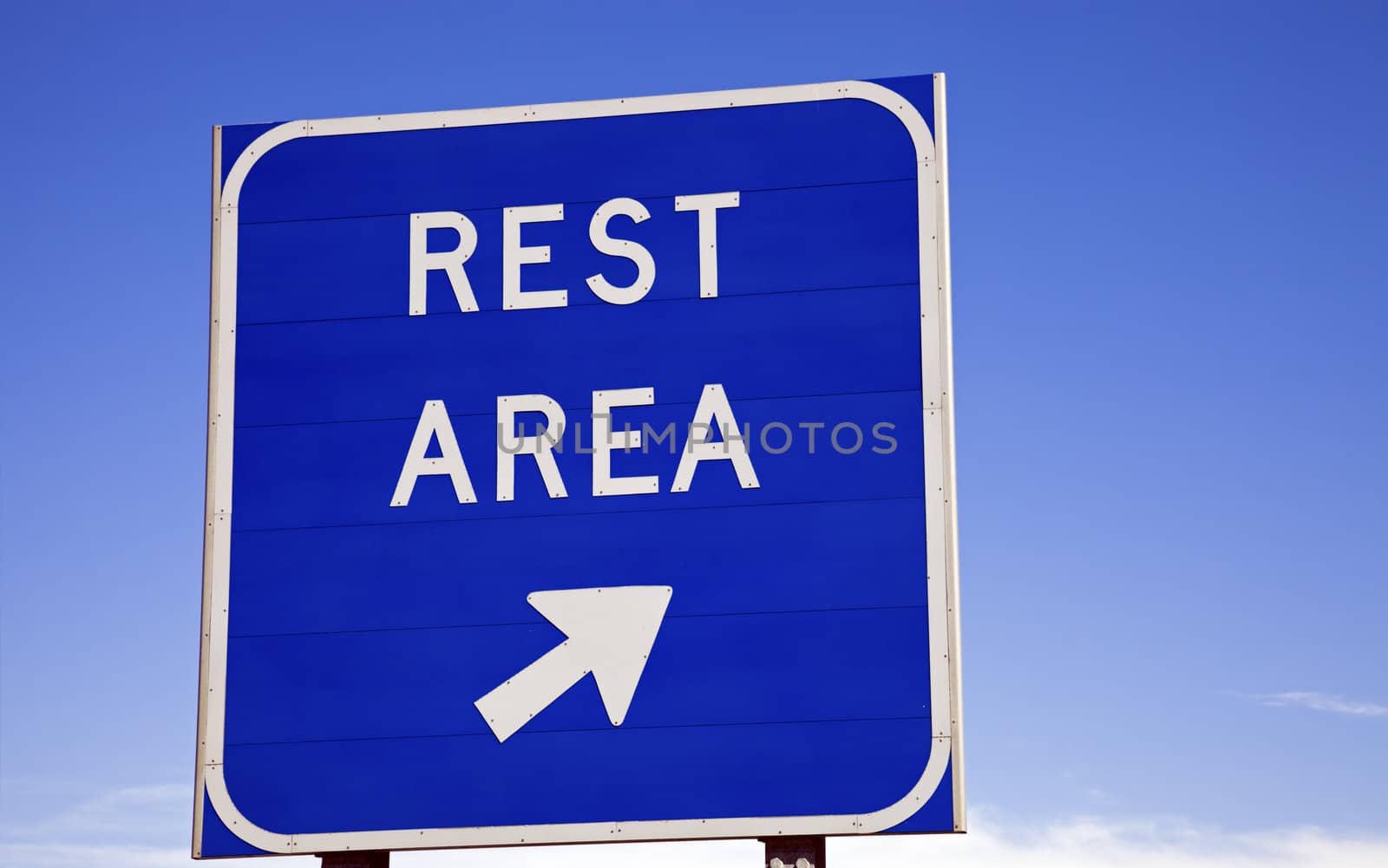 Rest area sign on the highway.