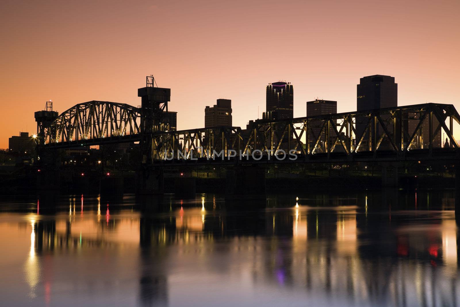 Sunset in Little Rock, Arkansas. Blurred barque in the foreground.
