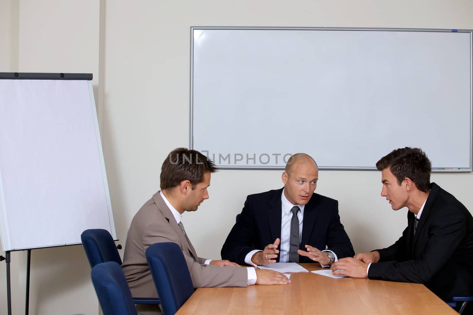 Businessmen in meeting at board room