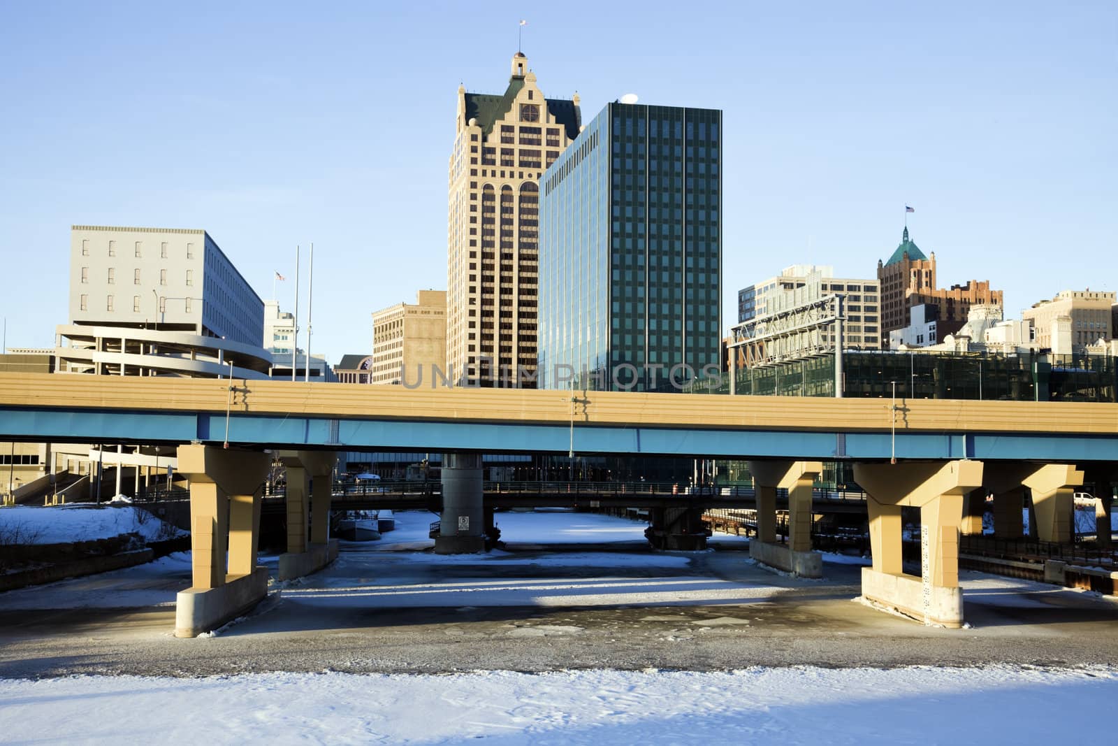 Downtown Milwaukee, Wisconsin above frozen river.