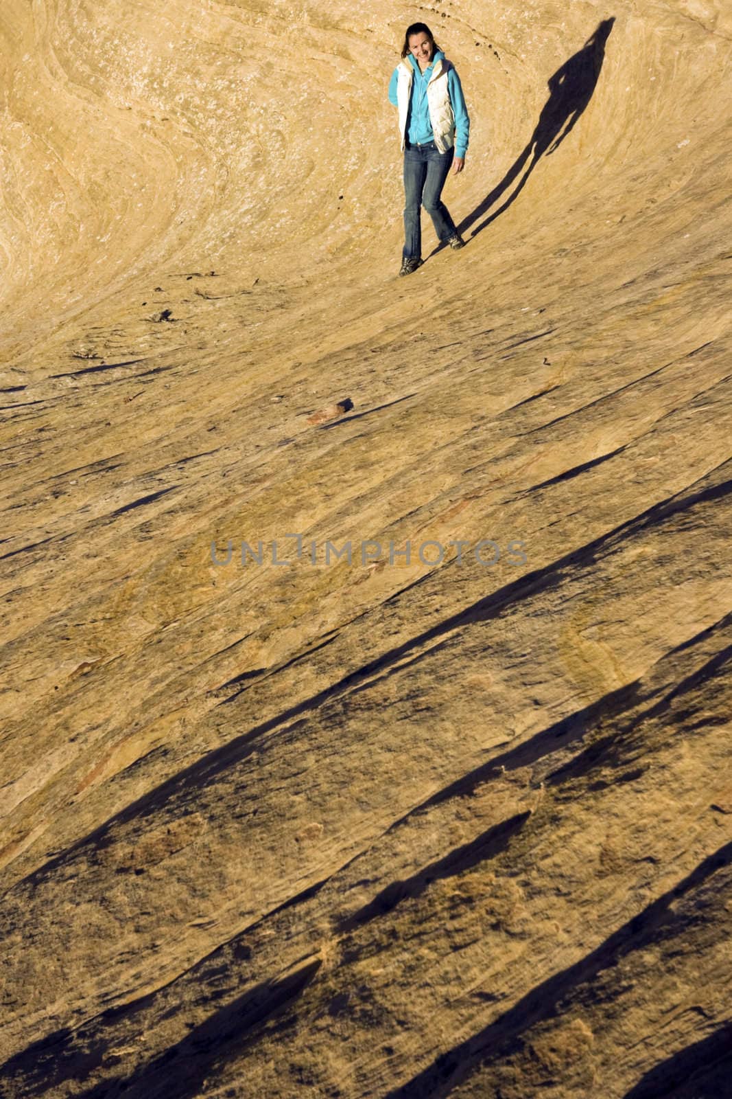 Girl walking Rock Waves in Utah