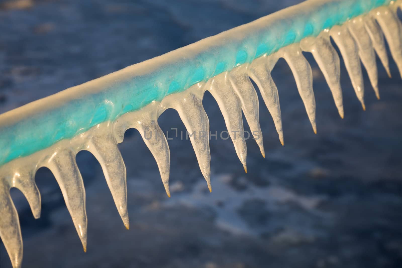 Icycles on the railing by Lake Michigan