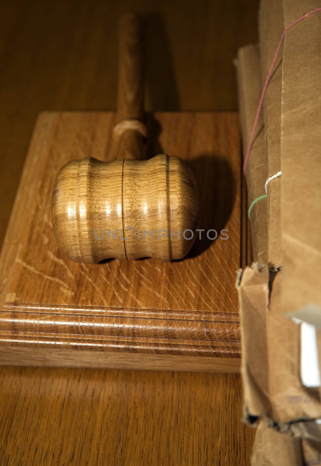 Hammer in the court - table in the courthouse.