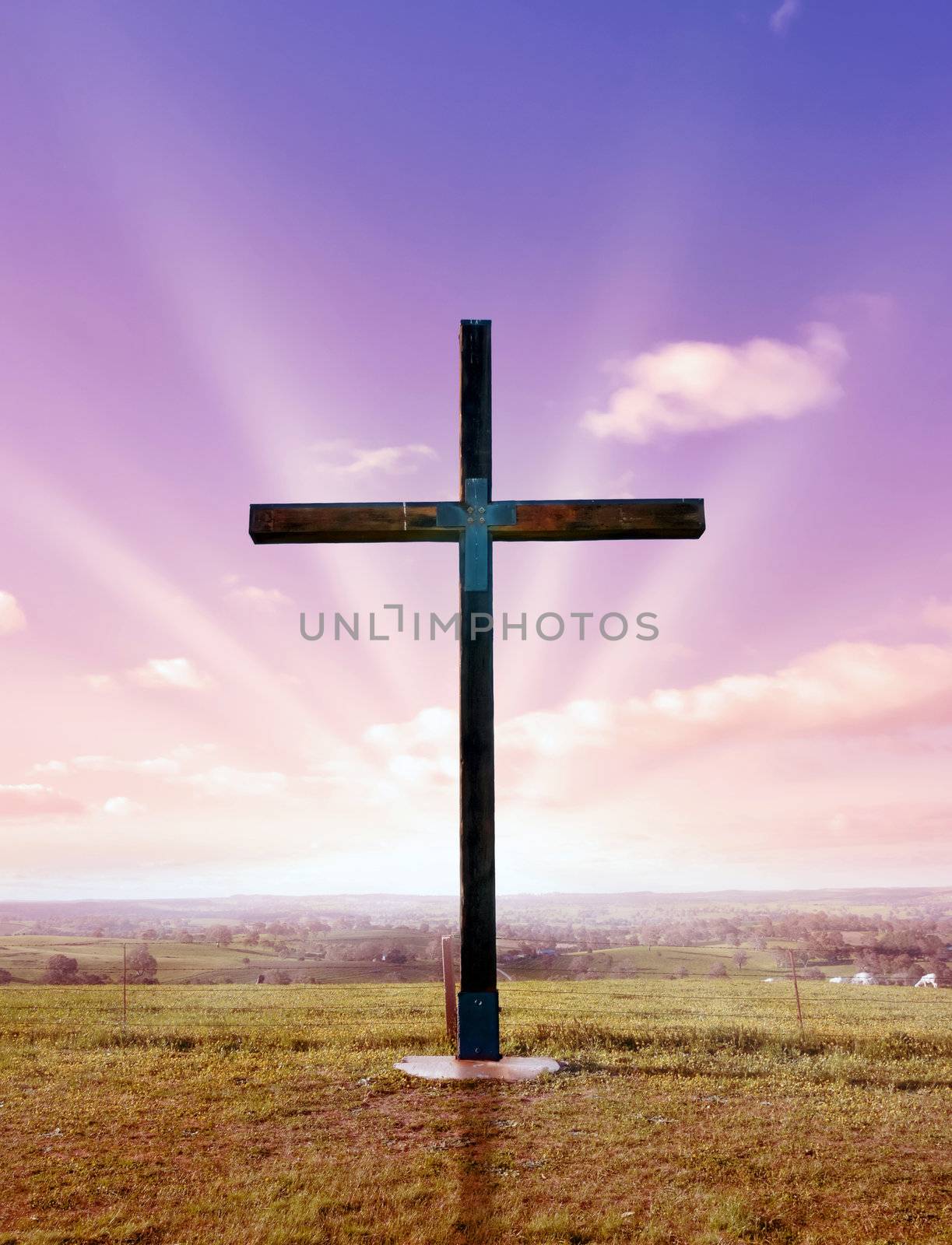 christian cross of christ at sunset or sunrise