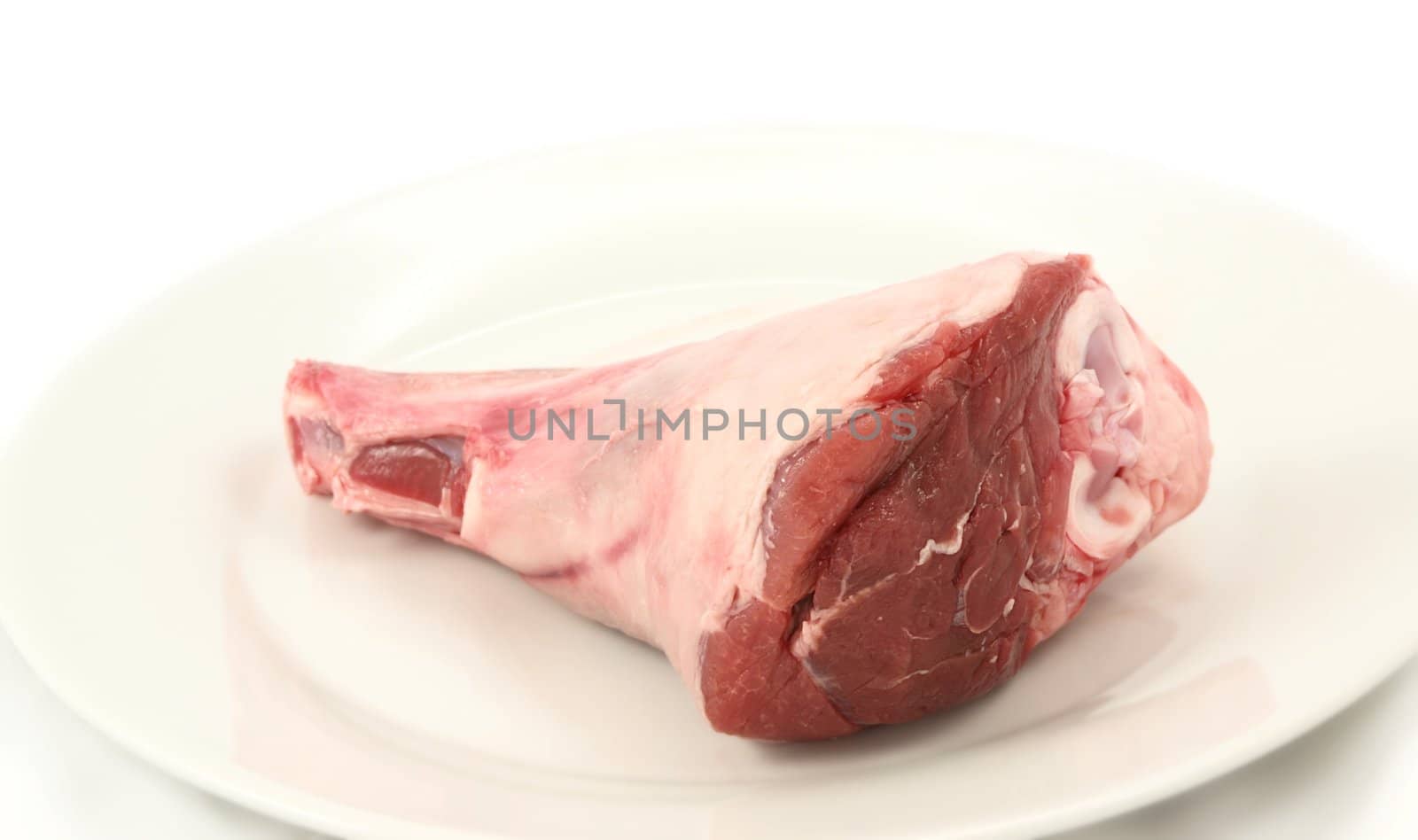 Fresh red meat, chops isolated on white plate