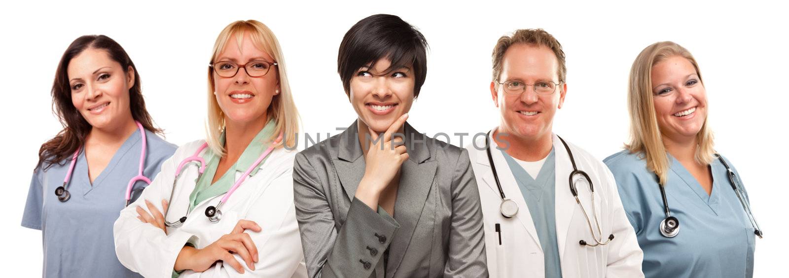 Young Multiethnic Woman with Doctors and Nurses Behind Isolated on a White Background.