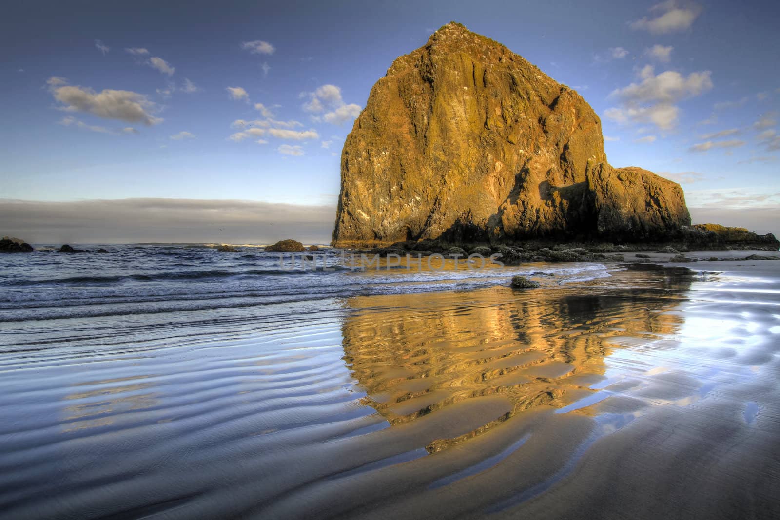 Reflection of Haystack Rock at Cannon Beach 2 by Davidgn