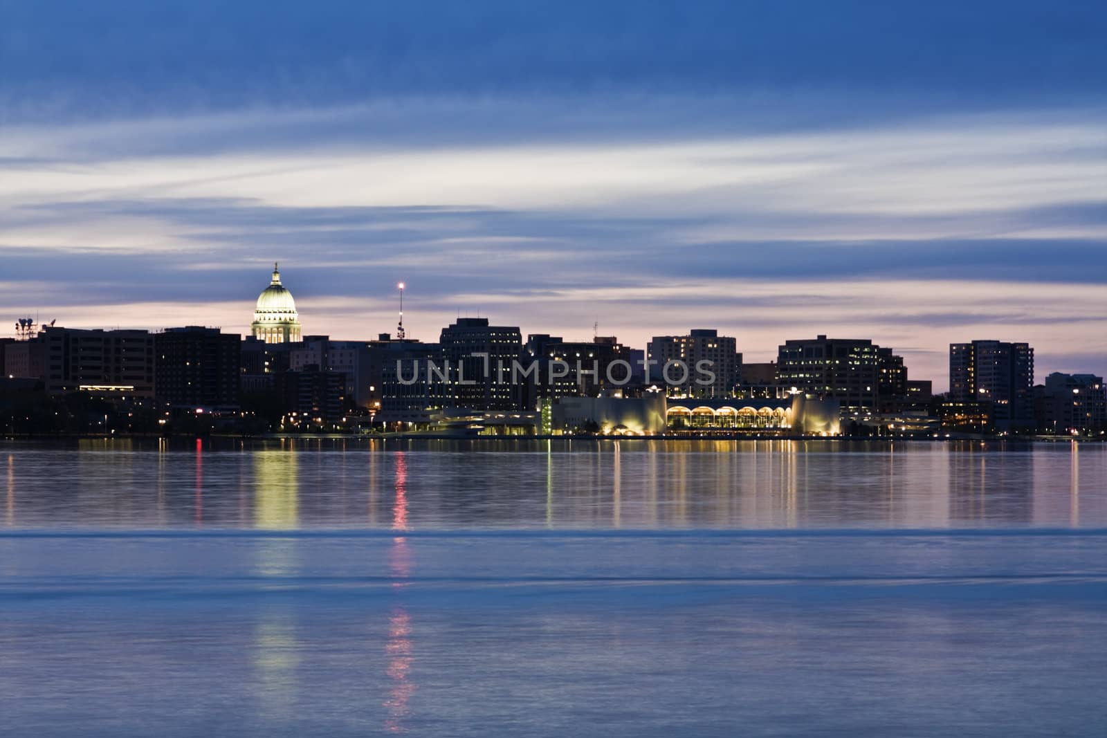 Downtown of Madison accross Monona Lake, night time.