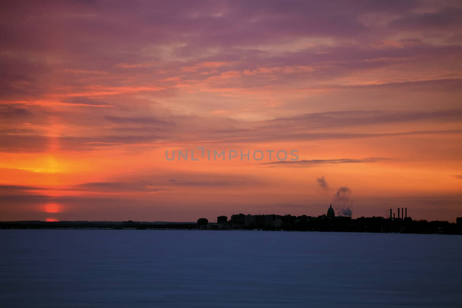 Sunset in Madison - silhouette of downtown right from the sun.