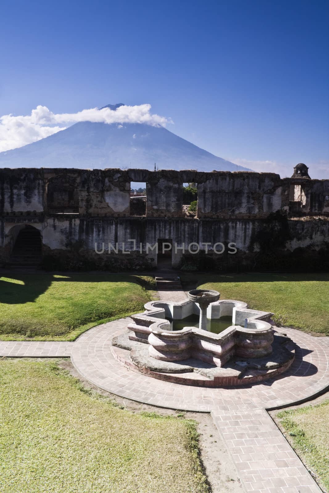 Fountain in Antigua - Agua volcano in the background