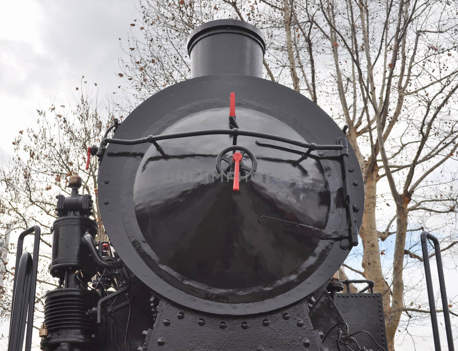 Detail of ancient steam train locomotive vehicle