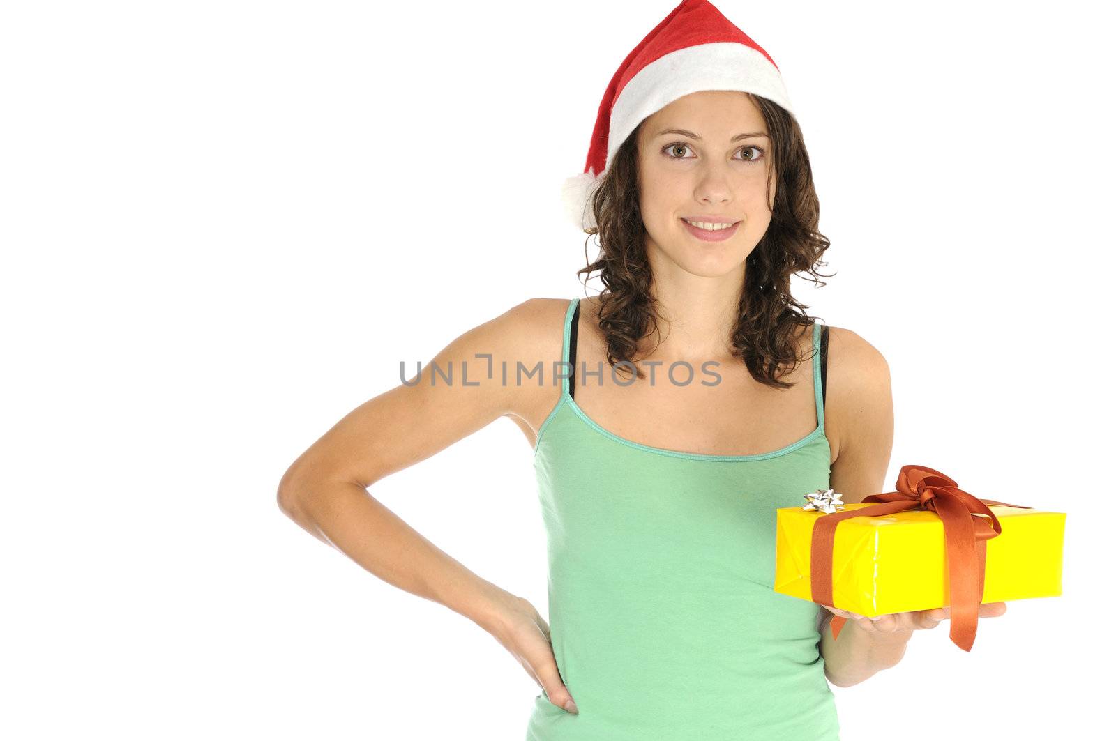 Girl holding christmas present by fahrner