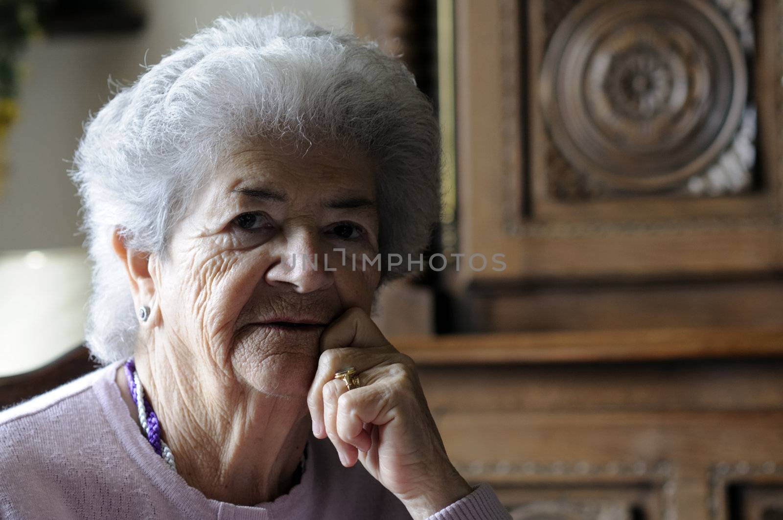 Sad senior woman (83 Years old) thinking about life.