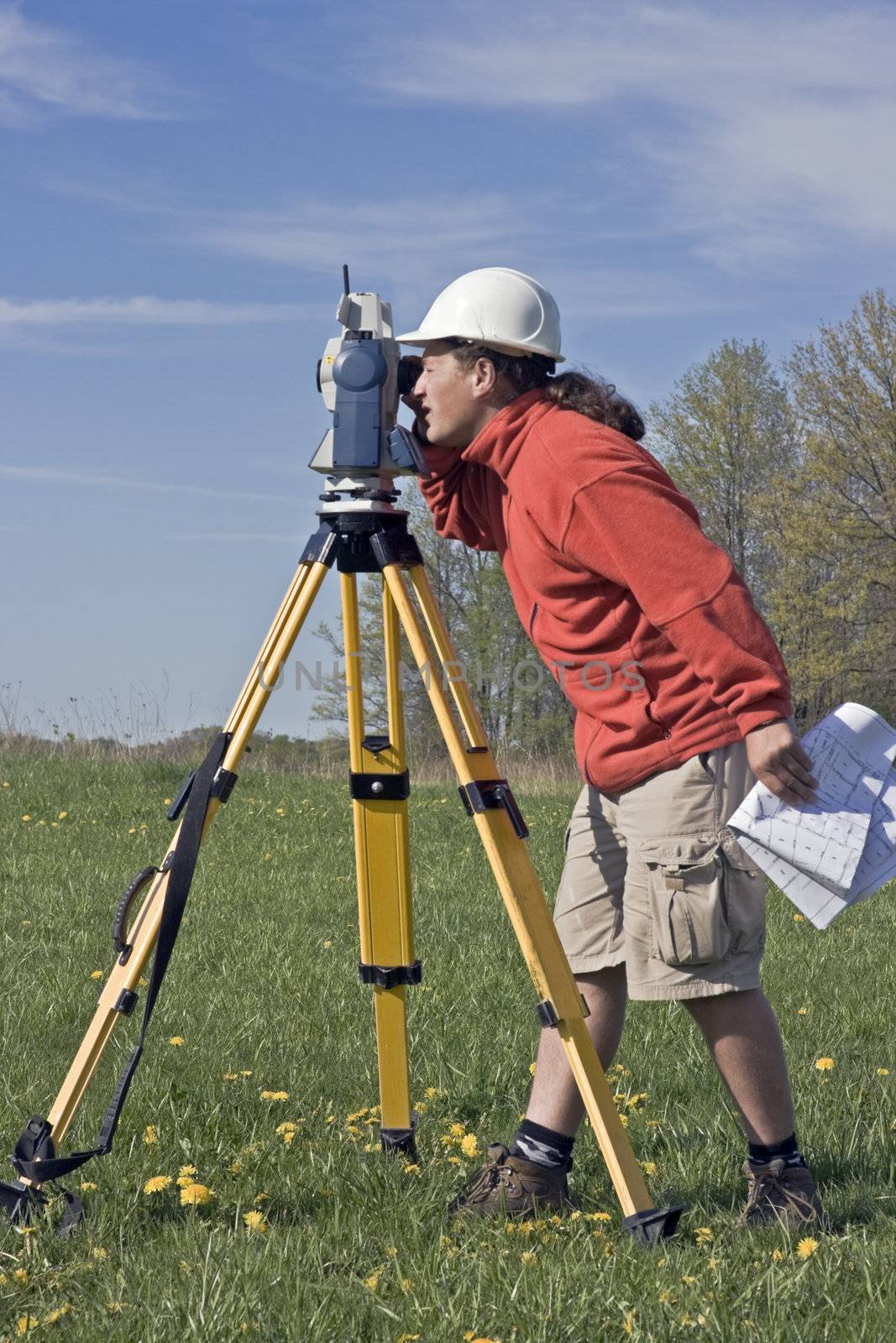 Land Surveyor at Work, spring time.