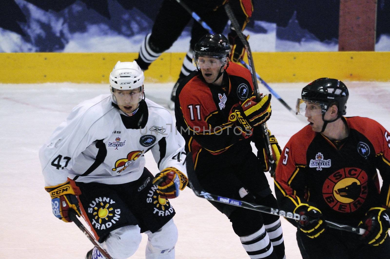 ZELL AM SEE, AUSTRIA - SEPTEMBER 3: Red Bulls Salute Tournament. Jean-Pierre Vigier (11) and Janne Lahti (47). Game Jokerit Helsinki vs. SC Bern (Result 0-2) on September 3, 2010 in Zell am See