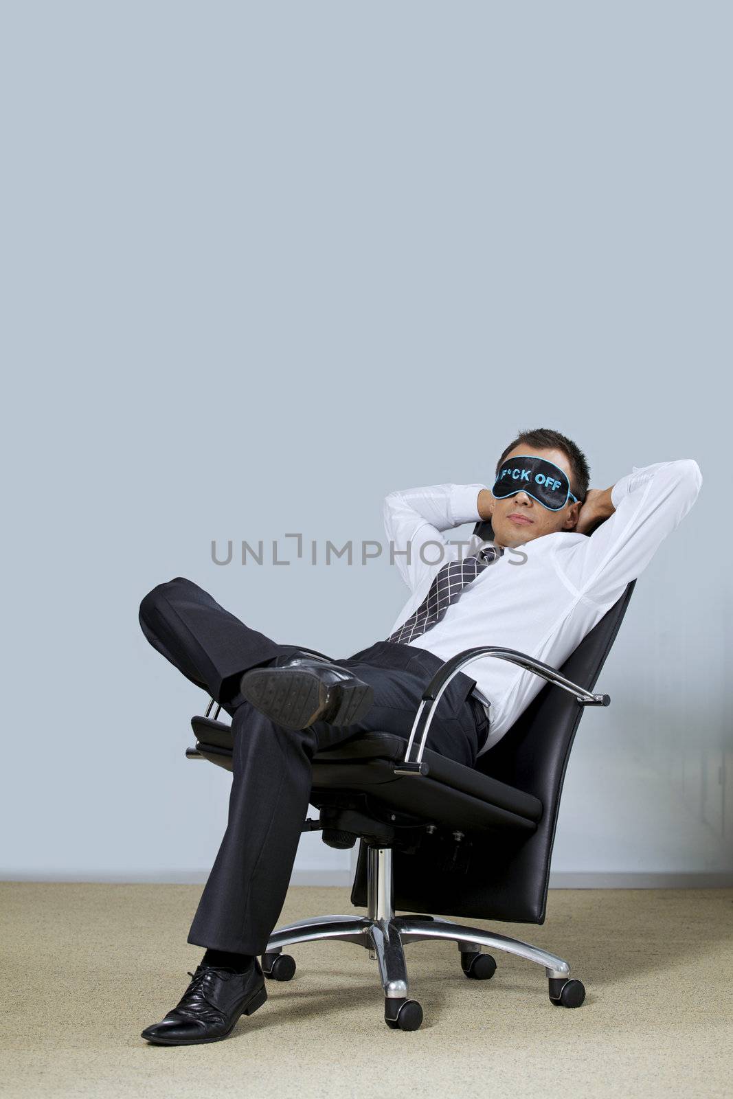 Businessman relaxing in office by krzysiek_z_poczty