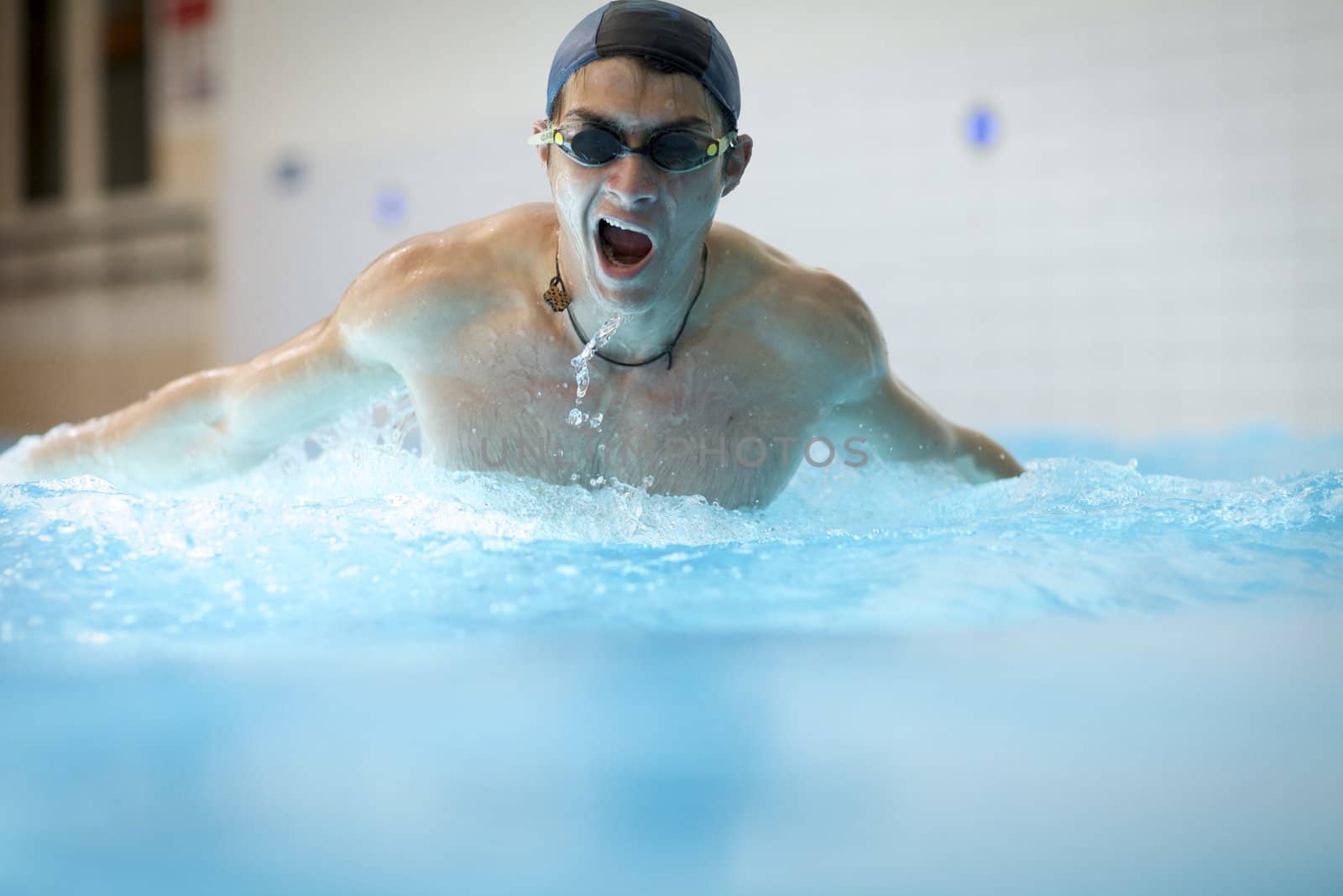 Swimmer Doing Butterfly Stroke by krzysiek_z_poczty